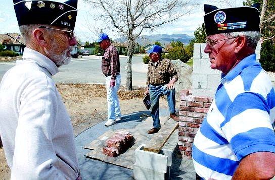 Rick Gunn/Nevada Appeal Korean War Veterans Association Chapter 198 members look over the memorial park being built at the east end of Fifth Street at Marsh Road Tuesday afternoon. Clockwise from left are Donald Barr, Fred Williams, Richard Hyde and Val Jensen. The Korean War Veterans Memorial Park will be dedicated May 30.