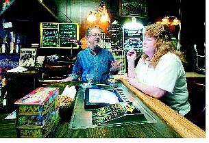 Stu and Dawn Miller, owners of the Crossroads Lounge in Carson City, talk about the first SPAM cookoff to be held in the bar on Saturday.    BRAD HORN/ Nevada Appeal
