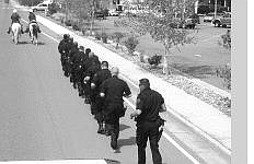 SWAT members run Tuesday in memory of 100 fallen police officers. The SWAT members ran one of 100 legs of the memorial run.   Photo submitted