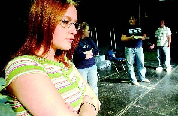 Rick Gunn/Nevada Appeal Carson High School student Ashly Domina plays a part in &quot;Power and Deception,&quot; an exploratory theater piece that CHS advanced-theater students will perform at the Brewery Arts Center on Tuesday and May 26.