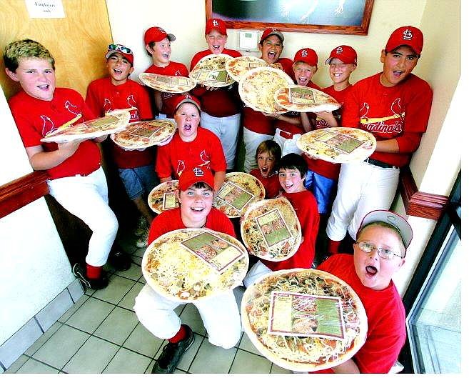 BRAD HORN/Nevada Appeal The Cardinals pose with their handmade pizzas at Papa Murphy&#039;s Pizza in the Albertsons Center in South Carson City on the morning of May 14.