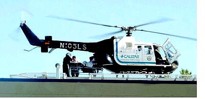BRAD HORN/Nevada Appeal Paramedics place a 2-year-old girl into a Calstar helicopter for transportation to Washoe Medical Center in Reno from Carson-Tahoe Hospital on Saturday. See story below.