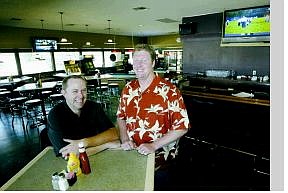 Cathleen Allison/Nevada Appeal Business partners Nate Lance, left, and Damon George have opened Mulligan&#039;s restaurant and sports pub in the old Tequila Dan&#039;s building on Highway 50.