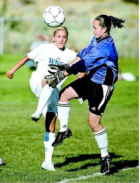 Cathleen Allison/Nevada Appeal Wildcat Phalon Mauntel shoots against Feather River College goalie Ashley Bennett Thursday afternoon as Western Nevada Community College played their first home game at Edmonds Sports Complex.