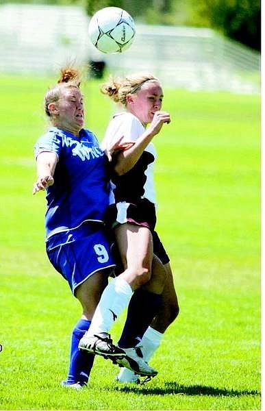 BRAD HORN/Nevada Appeal Melissa Foldfin fights for the ball against a Northern Idaho Cardinal during the first half at Edmonds Sports Complex on Saturday.