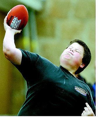 BRAD HORN/Nevada Appeal Dax Jones, 12, of Carson City, throws during competition at the Boys &amp; Girls Club of Western Nevada&#039;s Punt, Pass and Kick competition Saturday.