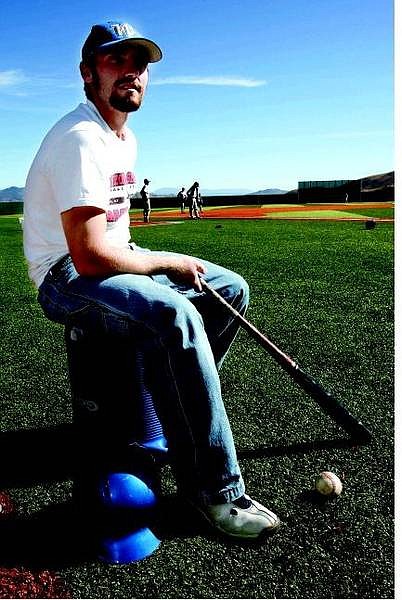 Chad Lundquist/Nevada Appeal Catcher, Aaron Greer, sits on the baseball field at WNCC on Wednesday.