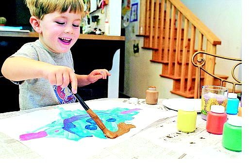 Three-year-old Noah Lyle has been selling his paintings on eBay.    BELOW: Noah&#039;s work &quot;Purple Goldfish&quot;     Julie Sullivan/ Nevada appeal News Service