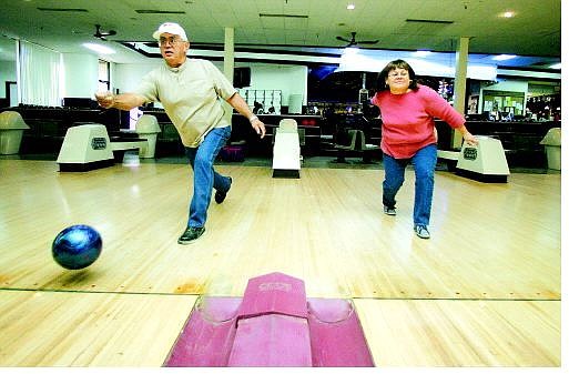 BRAD HORN/Nevada Appeal Gary and Sharon Wood bowl a warm-up game at the Carson Lanes on Wednesday. Gary and his wife will be running the 21st annual American Indian Bowling Tournament during the Nevada Day weekend.