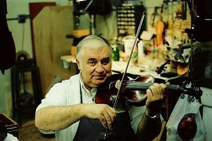 Submitted photo Dennis Butterfield, a string repairman, restored the historic violin in his Reno Maytan Music Center shop. He will play it with his orchestra during the 1864 Governor&#039;s Ball tonight at Piper&#039;s Opera House in Virginia City.
