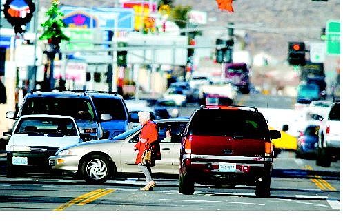 BRAD HORN/Nevada Appeal An elderly woman crosses Carson Street in the downtown area on Friday afternoon. The city&#039;s master plan will address downtown and traffic issues, as well as the growing elderly population.
