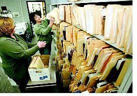 Cathleen Allison/Nevada Appeal Carson City Sheriff&#039;s Records Clerks Milani McKinley, left, and Rebecca Neep pack up old records Friday for the move across town. They estimate they&#039;ll fill between 800-1,000 boxes with old records dating back to the late 1960s.