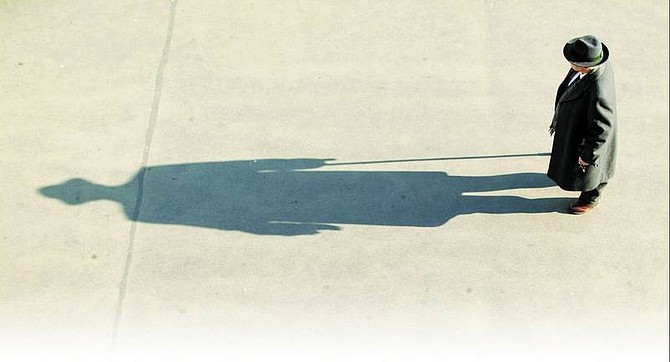 Rick Gunn/For the Appeal A Viennese man&#039;s shadow precedes him.