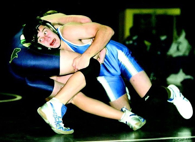 BRAD HORN/Nevada Appeal Carson wrestler Martin Azzam, 152-weight class, competes against Damonte Ranch in Carson on Wednesday. Azzam won his match.