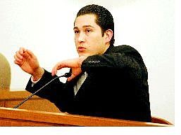 BRAD HORN/Nevada Appeal Maximilliano Cisneros describes how he was afraid he was going to be shot when he opened fire and then ran, leaving one man dead and another injured. Cisneros took the stand to answer charges of second-degree murder and attempted murder in connection with the May 24, 2004, shooting.