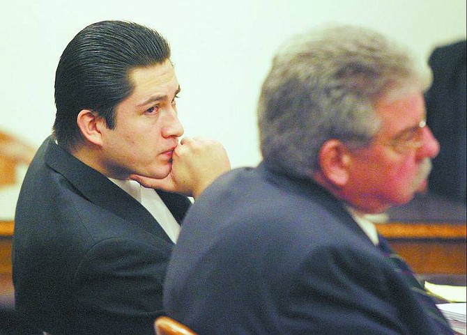 Maximiliano Cisneros listens to the prosecution present closing arguments at the Carson City courthouse on Friday. Cisneros was found guilty today of  second-degree murder.
