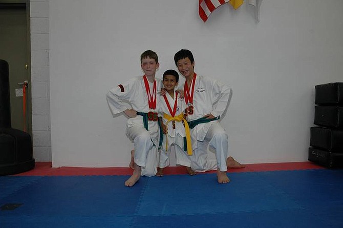 From Left, Taylor Bradshaw, Varun Pandit and Nick Hummel won medals at the Stanford Spring Open Tae Kwon Do championship.