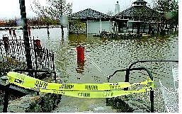 Shannon Litz/Nevada Appeal News Service Walley&#039;s Hot Springs Resort flooded near the gazebo Saturday. In the Carson Valley, Genoa and the Foothill area were hit hardest by the storm.