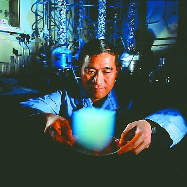 Peter Tsou, Jet Propulsion Laboratory scientist, shows  off a sample of Aerogel, used on the Stardust  spacecraft to  capture comet  particles from Comet Wild-2.   NASA Jet Propulsion  Laboratory