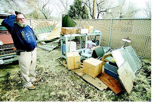 BRAD HORN/Nevada Appeal Jim Billig, of 2113 Kansas St., said the wind gusts that reached 98 mph on Saturday night in Carson City ripped his shed off its foundation and threw it into his fence. Somehow, the contents remained undisturbed.
