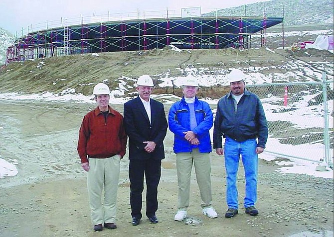 Photo submitted Four Carson City Rotary Presidents - Bob Crowell (2007-2008), Bret Andreas (2006-2007), John Allen (2005-2006), and Rafael Cappucci (2004-2005) - stand in front of the construction site for the Carson Tahoe Cancer Center. The Rotary Club has committed to raise $200,000 over the next three years for the center.