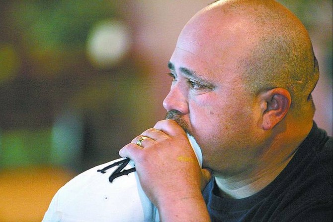 Alberto Garcia watches the final seconds of the Wolf Pack game Thursday afternoon at Stew&#039;s Sportatorium. An  overlooked Montana team jumped out to an early lead and never looked back,  leaving Nevada fans shocked at their team&#039;s early exit from the big dance.  Cathleen Allison/Nevada Appeal