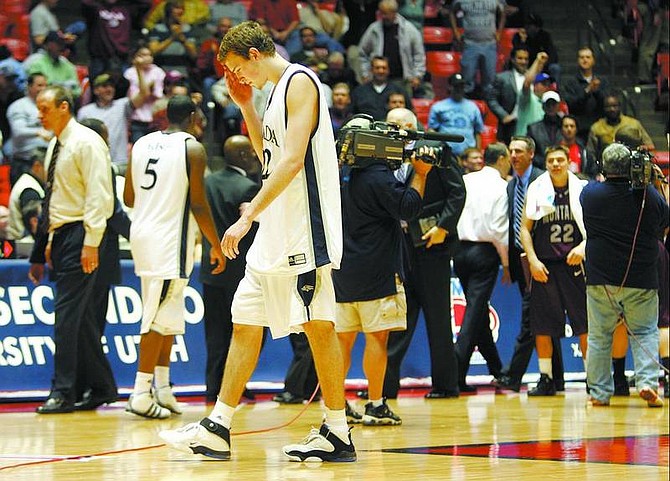BRAD HORN/Nevada Appeal Nevada junior forward Nick Fazekas reacts after the Wolf Pack lost their opening round game to the Montana Grizzlies 87-79 at the Huntsman Center in Salt Lake City on Thursday.