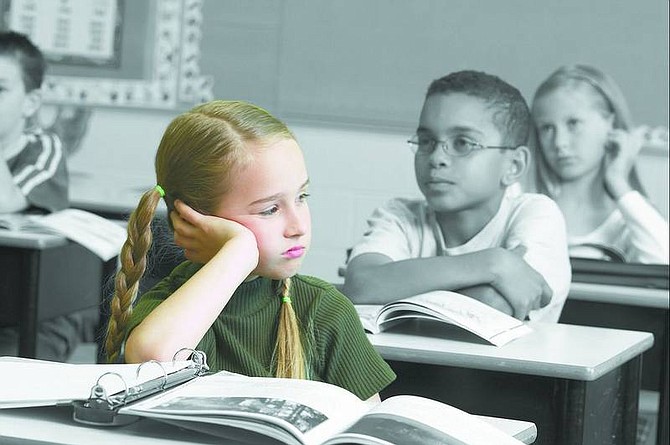Photo illustration by Phil Wooley Researchers found that children who were chronically rejected by their classmates were more likely to withdraw from school activities and scored lower on standardized tests than their more popular peers.
