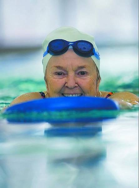 Chad Lundquist/Nevada Appeal Marian Artesani, 80, swims laps at the Carson City Aquatic Center Monday afternoon. Artesani, has swam more than 417 miles in the pool over the past 17 years.