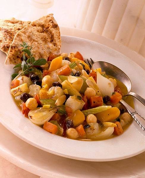 Moroccan Vegetable Ragout with Raisins is a full-flavored dish blends spicy and sweet and gets substance from potatoes and beans, among other vegetables, and the contrast of raisins. Serve it with grilled pita or other flat bread.   California Raisin  Marketing Board
