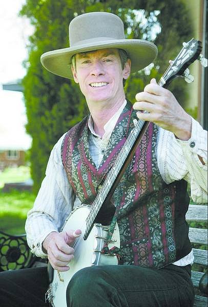Chris Bayer will  perform Monday at the Brewery Arts Center, showcasing songs of the miners on an early 19th century fiddle and  a banjo.  Cathleen Allison/ Nevada Appeal