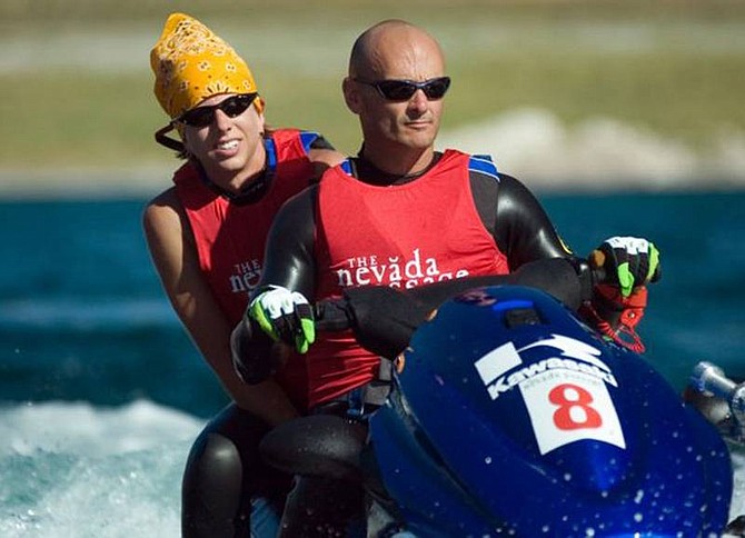 Nevada Commission of Tourism/AP Photo Brian Rothell piloting a jet ski with Erin Price during the Nevada Passage competition in May 2005 on Lake Mead in Nevada.