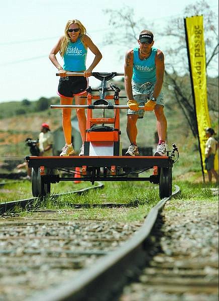 Chad Lundquist/Nevada Appeal Stephanie Weisel, 43, of Paia, Hawaii and Casy Fannin, 45, of Birmingham, Al., compete as Team Entrepreneurs in the Nevada Passage Handcar Races in Virginia City on Wednesday morning.