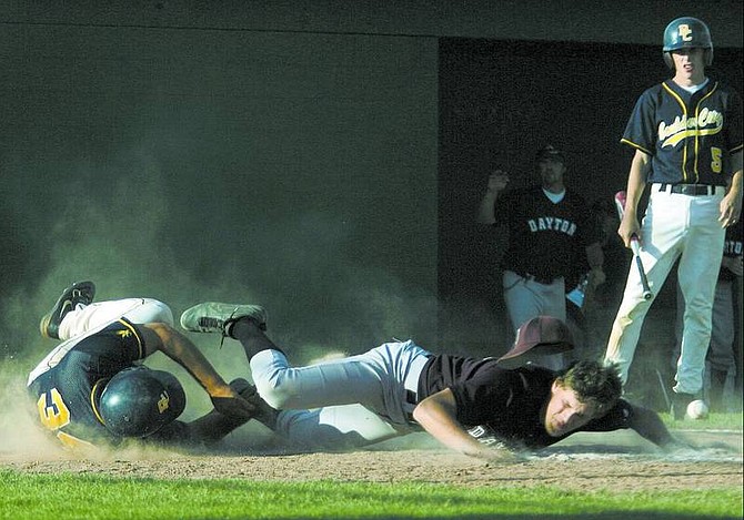 BRAD HORN/Nevada Appeal Dayton&#039;s Brandon Aguilera, right, collides with Boulder City&#039;s No. 34 during their 3A state playoff game at Damonte Ranch on Friday.