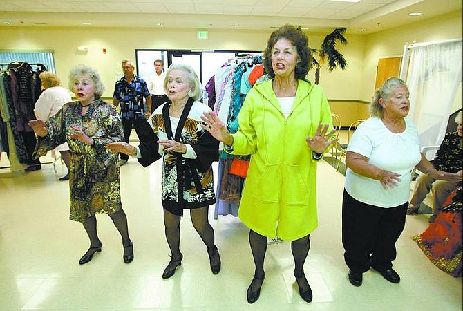 Cathleen Allison/Nevada Appeal From left, Alyce Dickson, Gladys Veitch, June McIntyre and Helen Glenn rehearse for the Senior Follies on Wednesday night at the Carson City Senior Citizen Center.