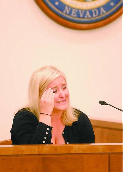 Kevin Clifford/Nevada Appeal Jennifer Wells cries during testimony Friday in the sentencing hearing of Tyler Cruz, 24, who admitted his part in the October murder of her brother Adam Wells. Cruz received 10 years to life in prison.