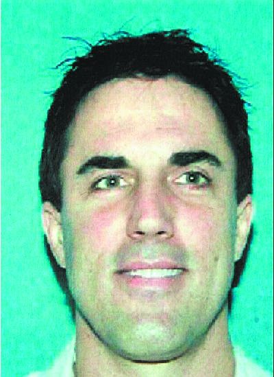 The Reno Police Department released this undated handout photo of Darren Mack, whom they are calling a &quot;person of interest&#039; in the shooting of a family court judge, Monday, June 12, 2006, in Reno, Nev. Judge Chuck Weller was shot in the chest  by a shot or shots that came through his office window at the Mill B. Lane Justice Center. He was taken by ambulance to a hospital, where he was reported in serious condition. (AP Photo/Reno Police Department)