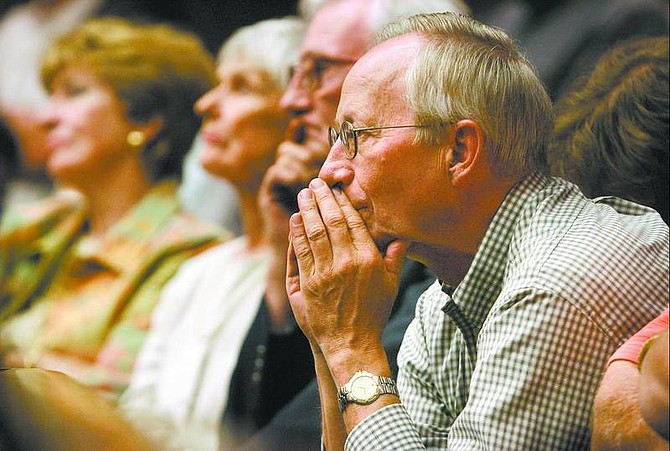 Cathleen Allison/Nevada Appeal Incline Village resident Wayne Fischer listens Thursday afternoon as the Nevada Supreme Court hears arguments regarding an appeal of a lower court ruling that rolled back property tax values.