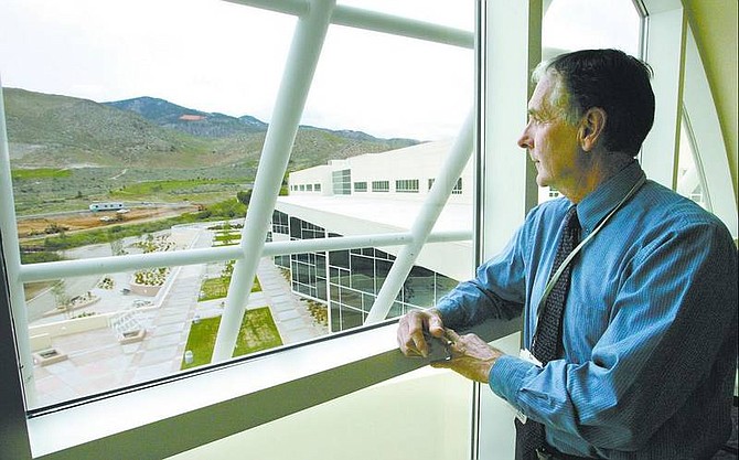 Cathleen Allison/Nevada Appeal Ed Epperson, regional healthcare president and chief executive officer of Carson Tahoe Regional Medical Center, checks out new construction on medical offices near the hospital Wednesday afternoon. Epperson said he walks around the campus several times a week to talk with staff and stay in touch with what&#039;s happening.