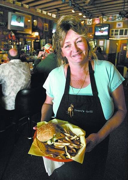 Randy Wright, also known as Mustang Sallie, has relocated her Deuce&#039;s Grill to the Old Globe Saloon.  Cathleen Allison/ Nevada Appeal