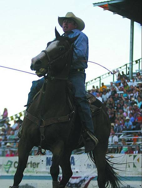 Brad Horn/Nevada Appeal Yose Campbell, of Stagecoach, ropes the heels of his steer at Wednesday&#039;s performance of the Reno Rodeo. His partner, Tye Fitzpatrick, of Carson City, roped the head. The two travel with Campbell&#039;s brother, Clint, and his partner, Waco McGill, of Gardnerville, to rodeos throughout the West.