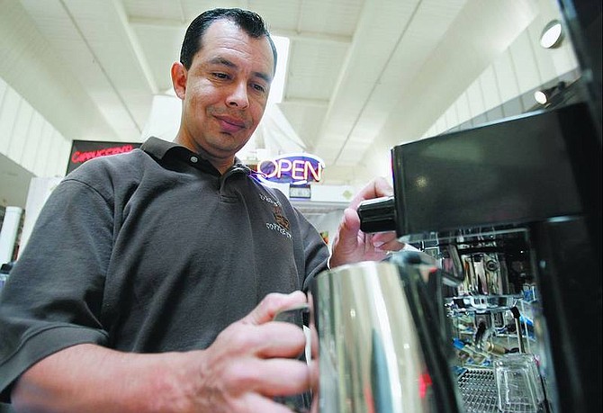 Chris Depew owner of &quot;Depew&#039;s Coffee To Go&quot; works at his shop in the Carson Mall on Wednesday.    Chad Lundquist/ Nevada Appeal