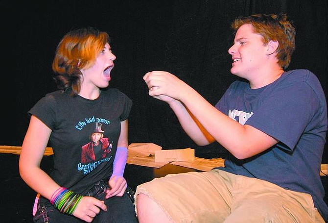 Kevin Clifford/Nevada Appeal Gus DeBacco, 15, asks Kenny Kinsey, 15, &quot;Will you kiss my wart?&quot; while practicing improv Monday afternoon at the Brewery Arts Center. The Improv Kids show will be Friday and Saturday.