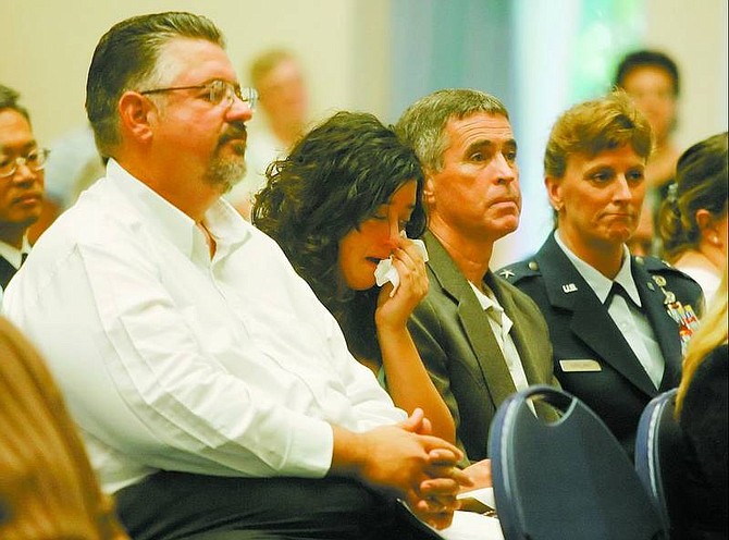 Brad Horn, Nevada Appeal From left, Kathy Augustine&#039;s brother Phil Alfano, Meghan Alfano, Richard Kirkland, and state Adjutant Gen. Cynthia Kirkland listen during a memorial service for former State Controller Augustine in the Assembly Chambers Wednesday.