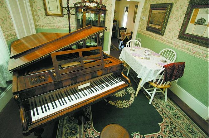 BRAD HORN/Nevada Appeal This Broadwood Baby Grand Piano was manufactured between 1843-1852 and donated to the Robert&#039;s House Museum by Mr. and Mrs. Victor McDonald on Nov. 17, 1984. The antique was crafted with rosewood.