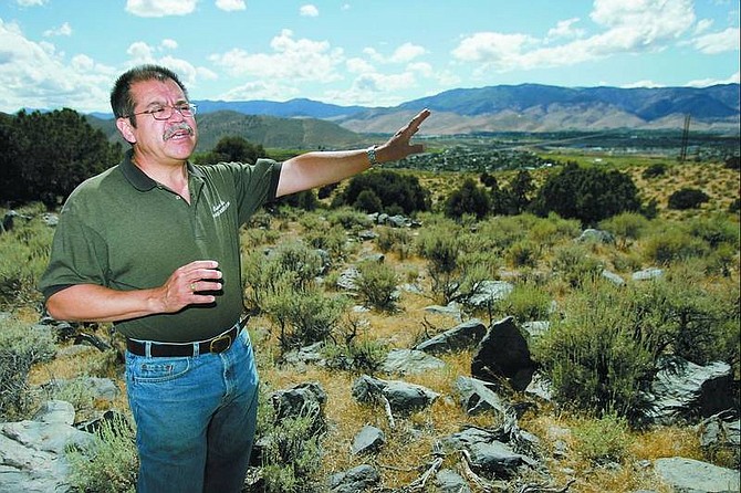 Chad Lundquist/Nevada Appeal Carson City Open Space and Property Manager Juan Guzman shows a portion of a 1,000-acre parcel east of Deer Run Road that the city hopes to trade with the U.S. Bureau of Land Management. The city hopes the trade will help simplify land management by both parties.