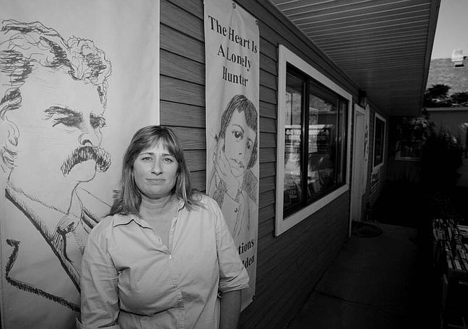 Leanne Lowe, manager and part owner of Westside Ink - Books, Pie, Art in  Carson City, grew up with six  siblings in a home where reading was encouraged. Lowe also attended Fremont  Elementary School,  where her husband now  teaches.  BRAD HORN/ Nevada Appeal