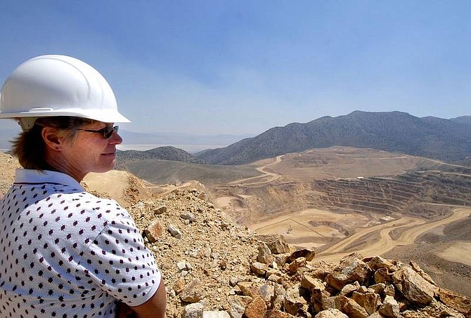 PHOTOS BY Kevin Clifford/Nevada Appeal Sandi Steele, of Carson City, looks over the phase 4 Rochester Pit at the Coeur Rochester Mine 25 miles outside of Lovelock on Friday afternoon during the 22nd annual Minerals Education Workshop. The mine is the world&#039;s seventh-largest silver primary mine, according to the company&#039;s Web site.