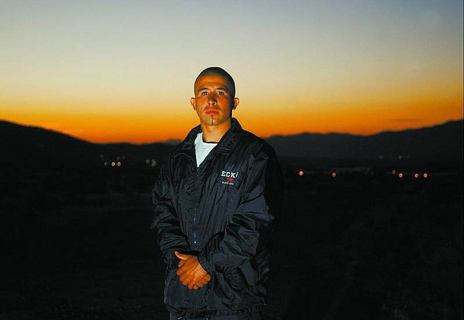 BRAD HORN/Nevada Appeal Michael Peralta&#039;s professional boxing debut is Thursday in Portland, Ore. The 23-year-old Carson High School graduate is pictured near his home in Mound House before a recent early morning run.