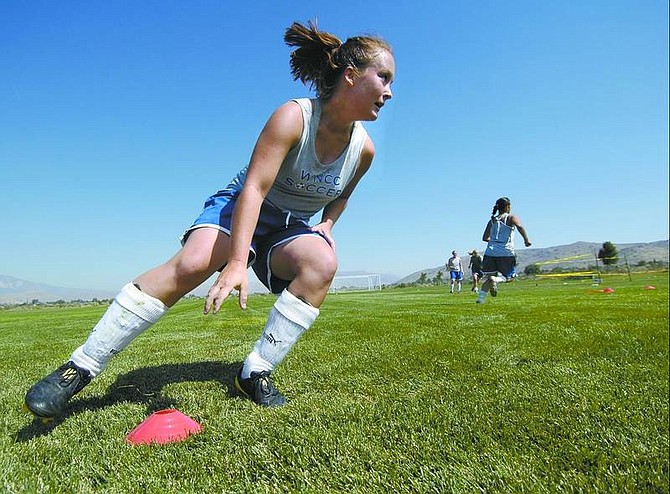 Kevin Clifford/Nevada Appeal WNCC soccer player Jessica Maule, 19, runs after tagging a cone during an exercise activity called &quot;star sprints&quot; at Edmonds Sports Complex on Tuesday.